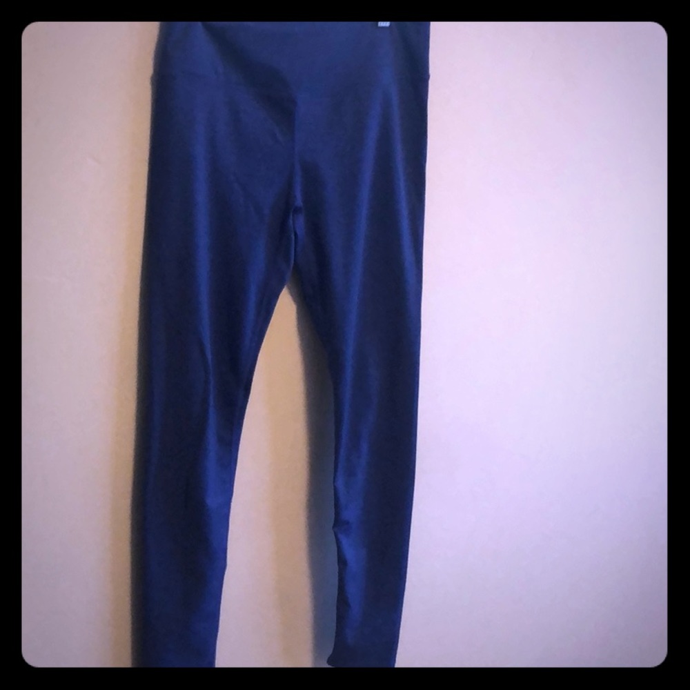Long Fabletics blue yoga leggings.